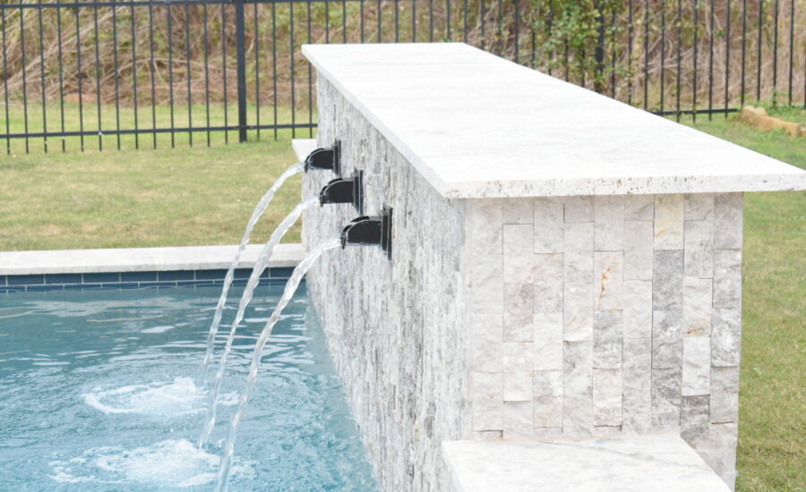 Raised wall with Water Sconces